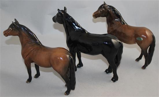 A collection of nine Beswick horses, late 20th century, average length 21cm